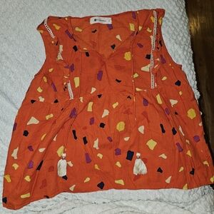 The Impeccable Pig size Large Sleeveleas blouse